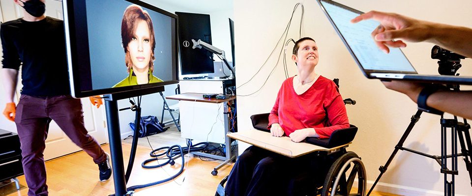 Research participant Ann uses a digital link wired to her cortex to interact with an avatar on May 22 in El Cerrito, Calif. PHOTO COURTESY OF NOAH BERGER, UCSF